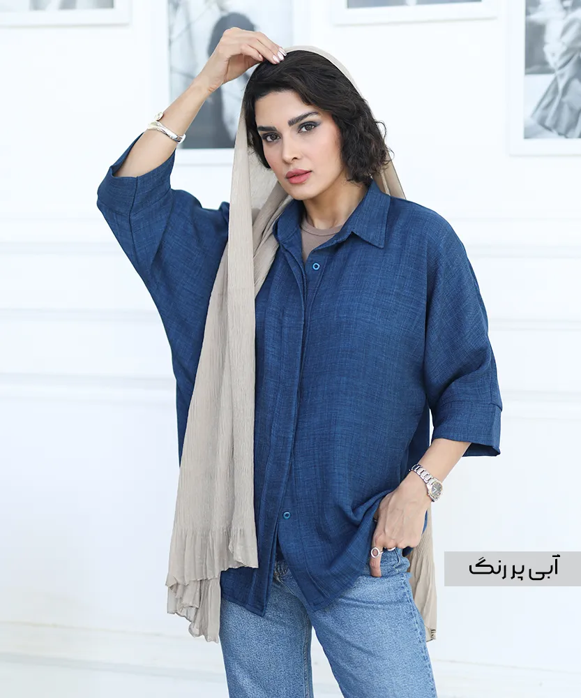 مانتو دکمه مخفی رنگ آبی کمرنگ